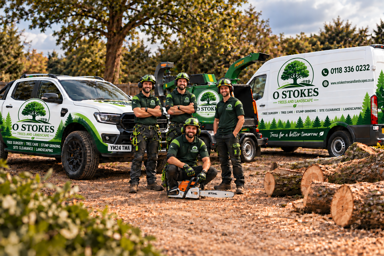 O Stokes tree surgery team with branded work vehicles at a woodland site